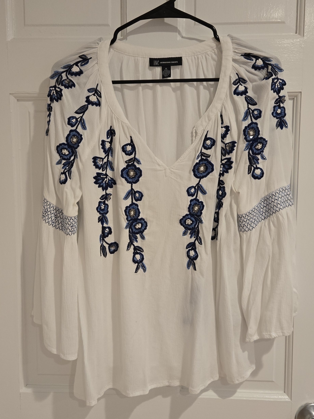 White V-Neck Boho Top with Blue Embroidery